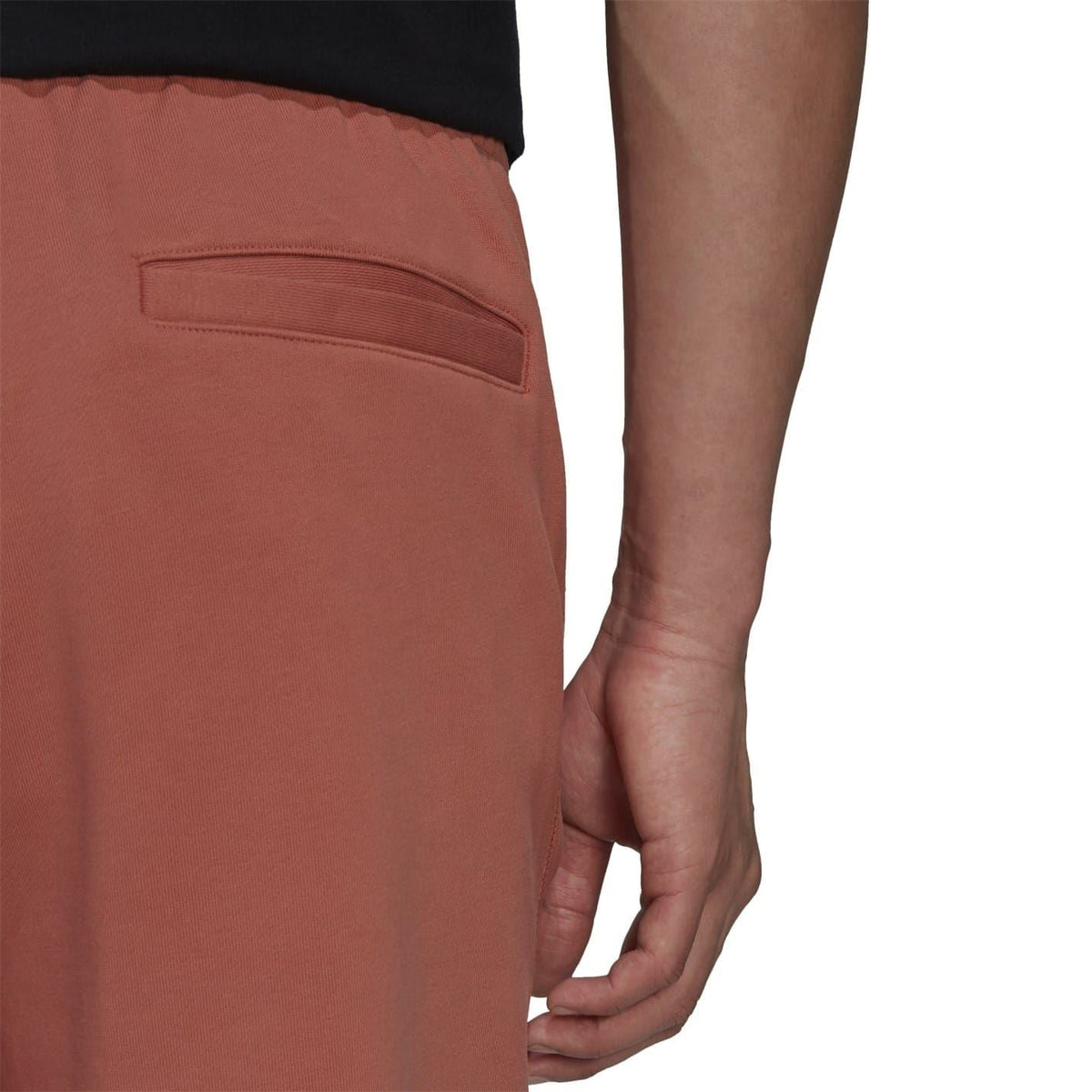 adidas Originals brown sweatpants detail, back pocket and tailored seam stitching