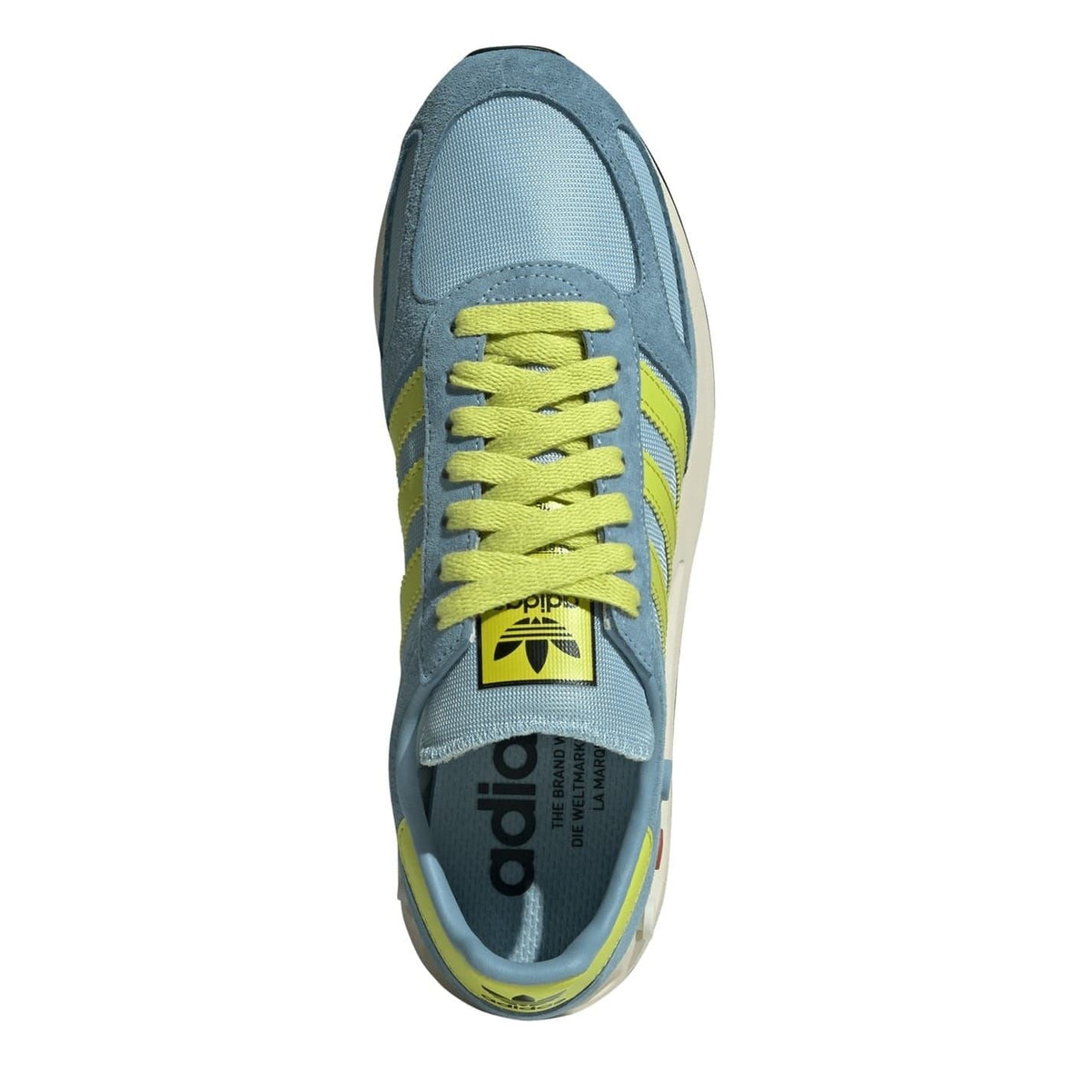 Side view of blue lace-up sneakers with lime laces and Adidas logo, cushioned collar
