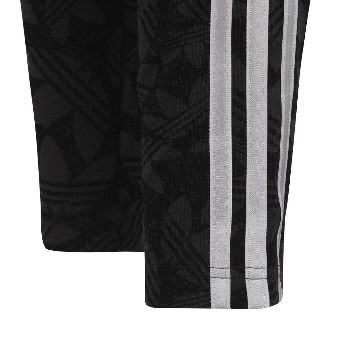 Black adidas leggings with allover print and side white triple stripe detail at hem