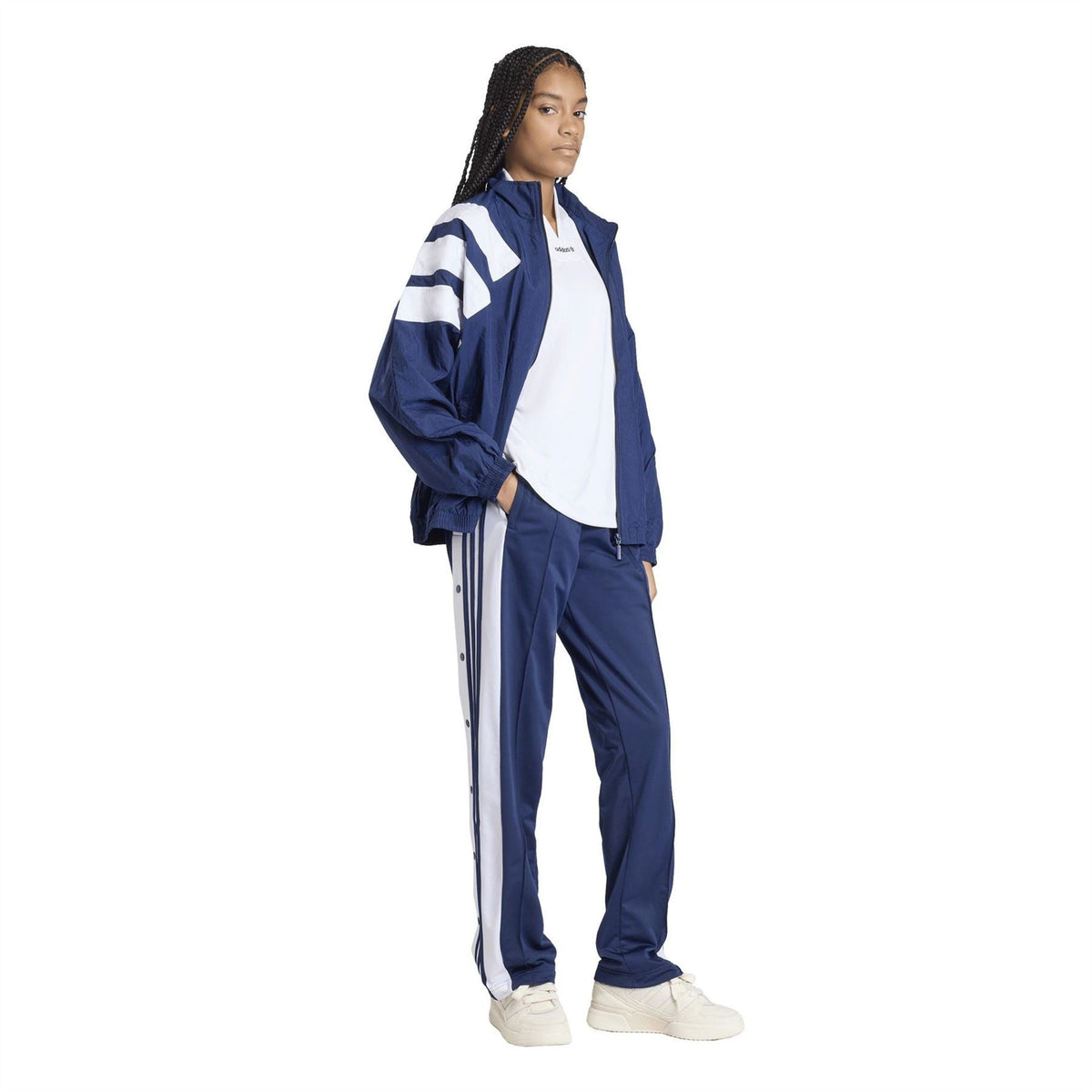 women’s adidas Originals tracksuit bottoms in dark blue with white side stripe detailing and cuffs