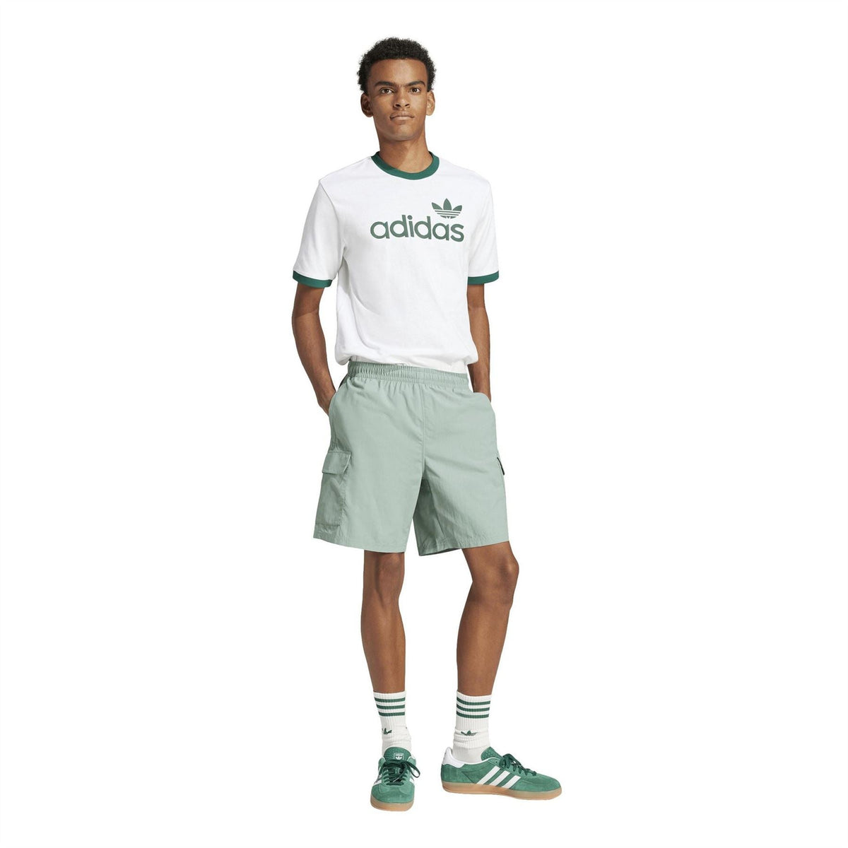 adidas Originals mint green shorts with elastic waistband and side pockets