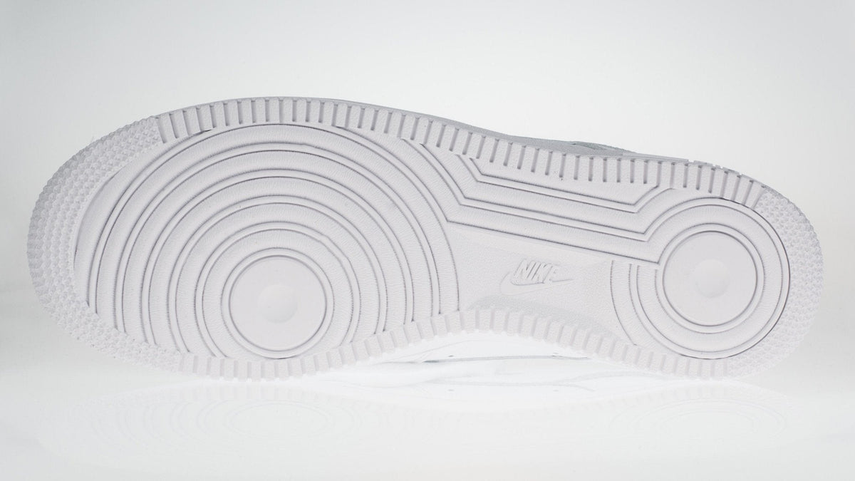 Kids Nike Air Force 1 LE white rubber outsole with circular traction tread