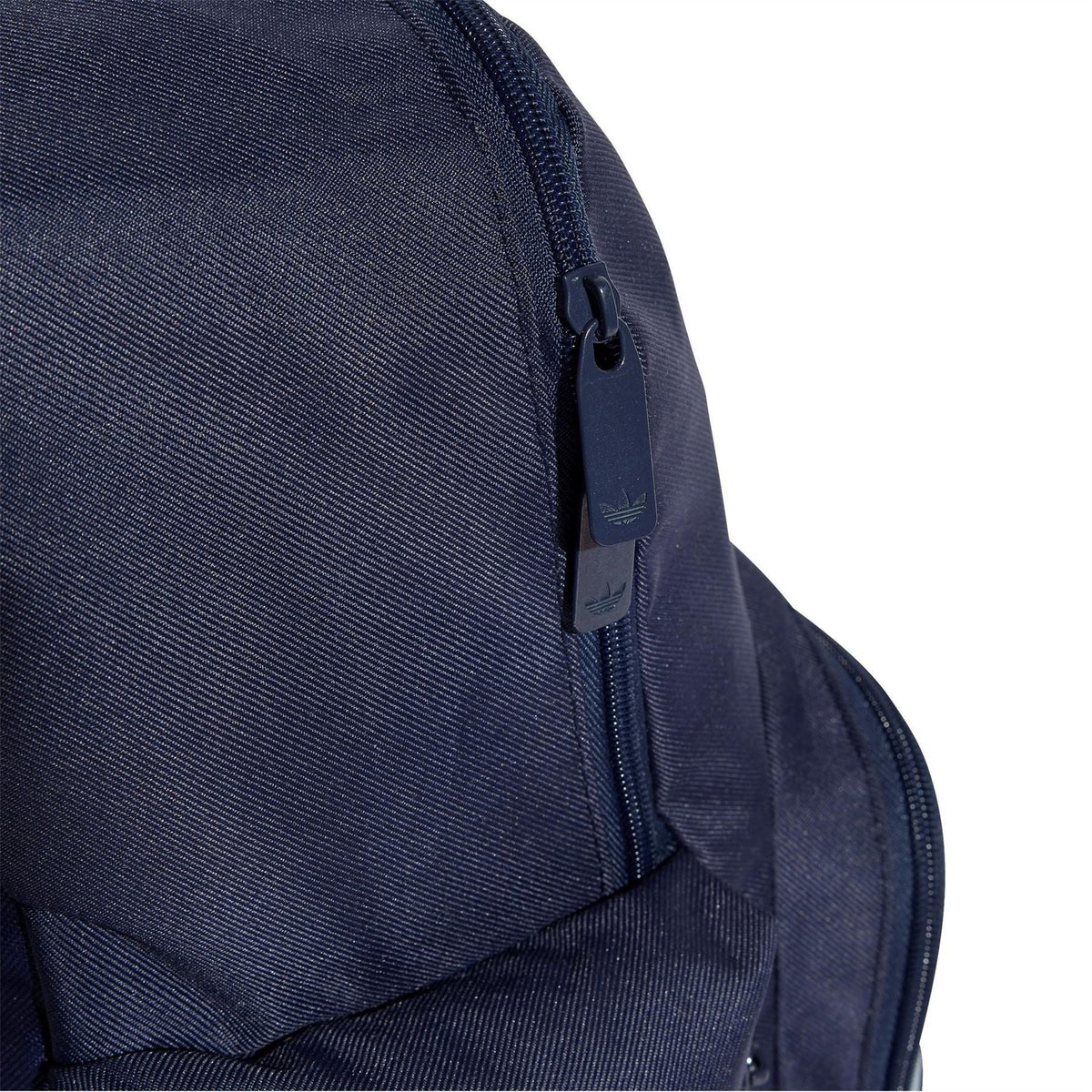 Night Indigo backpack close-up of side panel and zipper pull with adidas logo tag