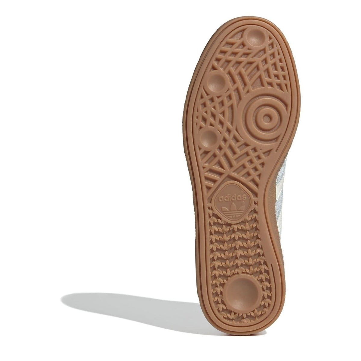 Brown rubber outsole with traction tread and adidas logo