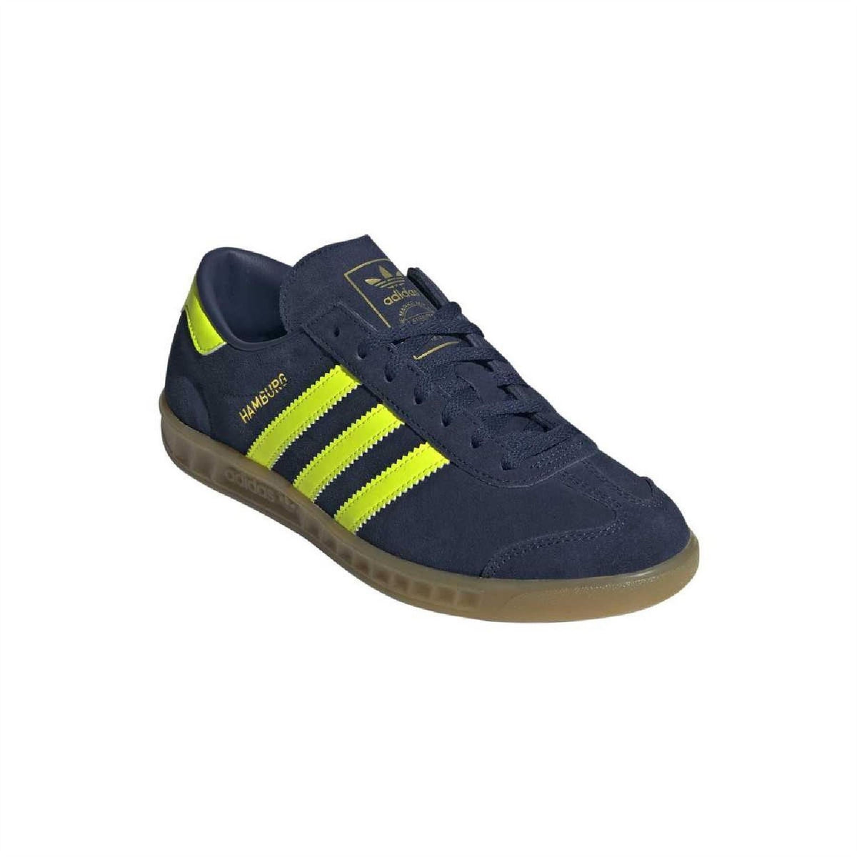 Dark navy adidas Hamburg sneakers with suede upper, neon yellow stripes, and gum sole