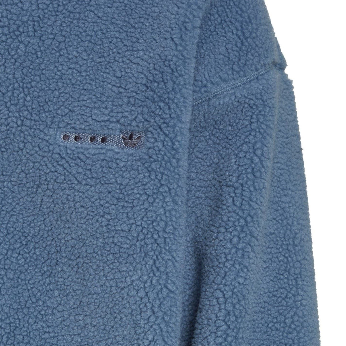 adidas Originals Sherpa Jacket in sweatshirt style with soft fleece lining and classic branding, shown in a cozy, stylish fit