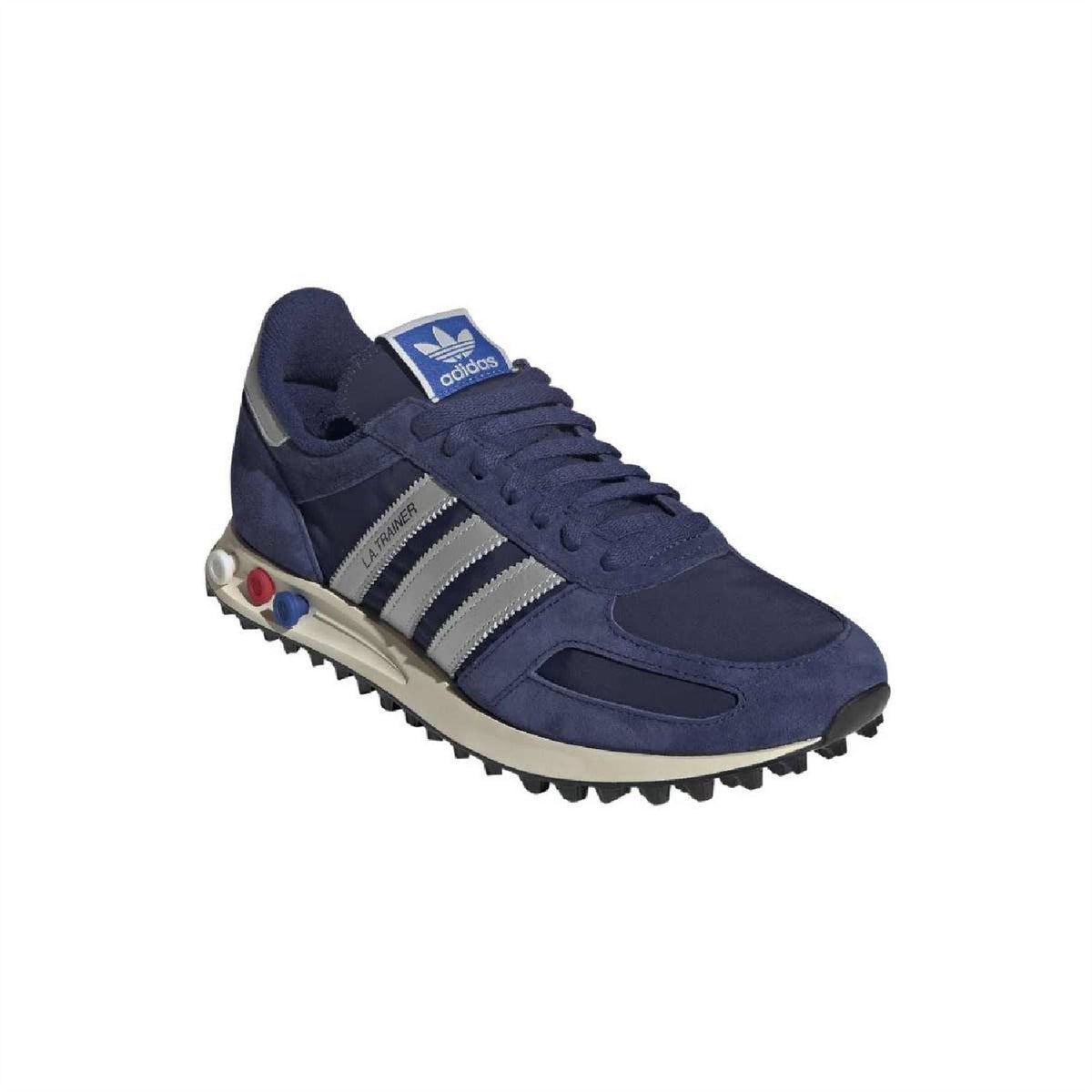 Dark blue adidas lace-up running-style shoes with white stripes and beige midsole