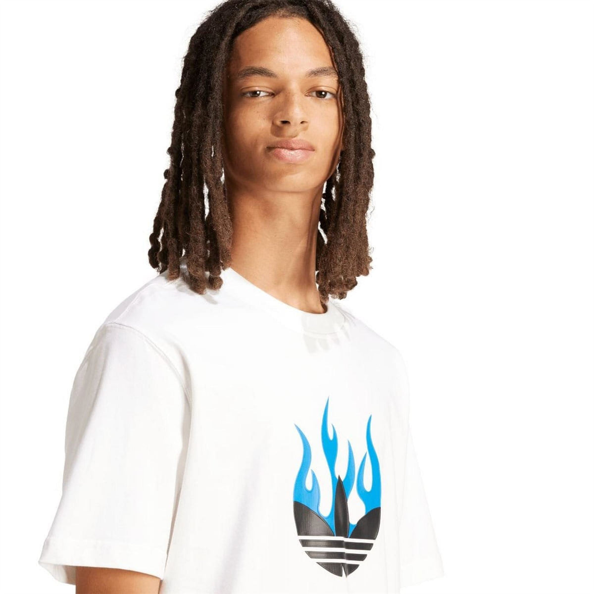 White T-shirt close-up with blue flame logo graphic on the chest, short sleeves