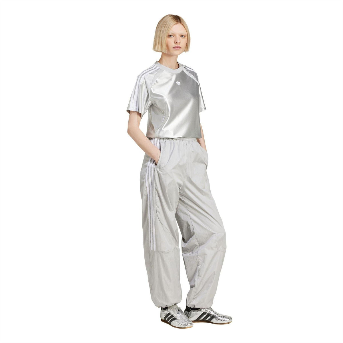 adidas light grey track pants with relaxed fit, drawstring waist, ribbed cuffs, stripes