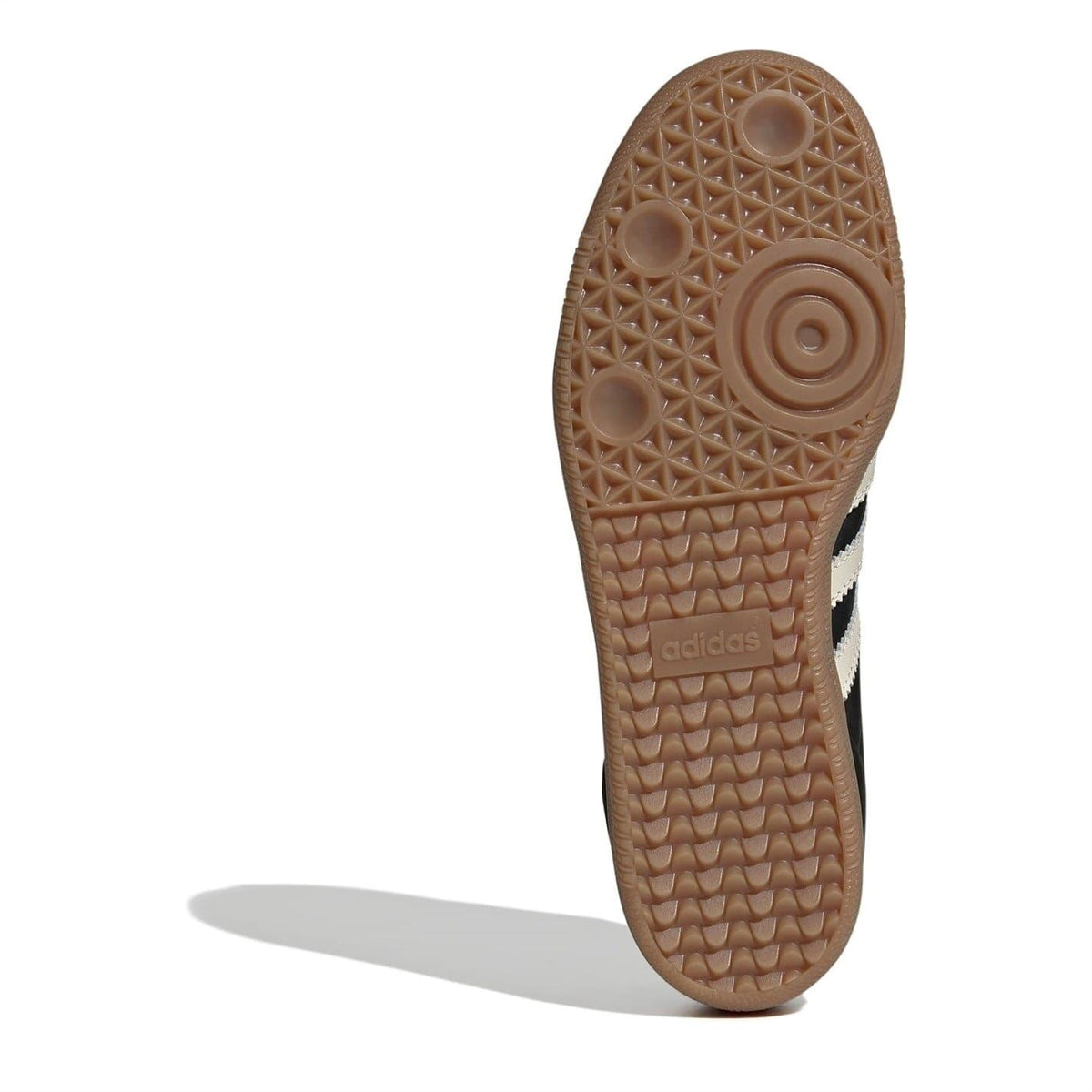 Gum rubber outsole with textured tread pattern for low-top sneakers
