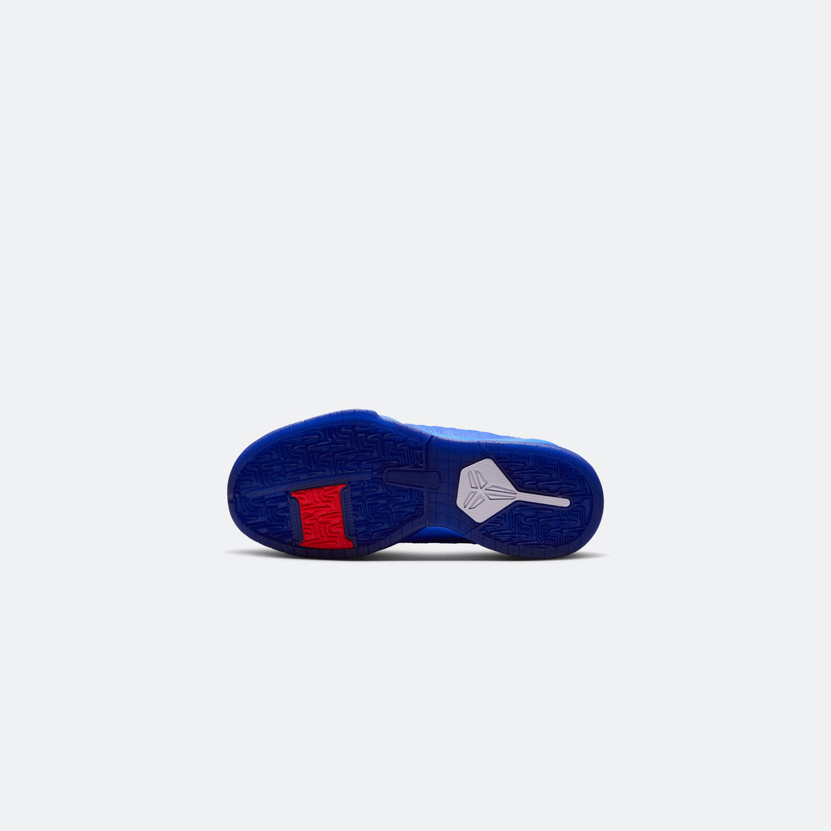Blue Nike Kobe V low-top kids basketball shoe outsole view with traction pattern