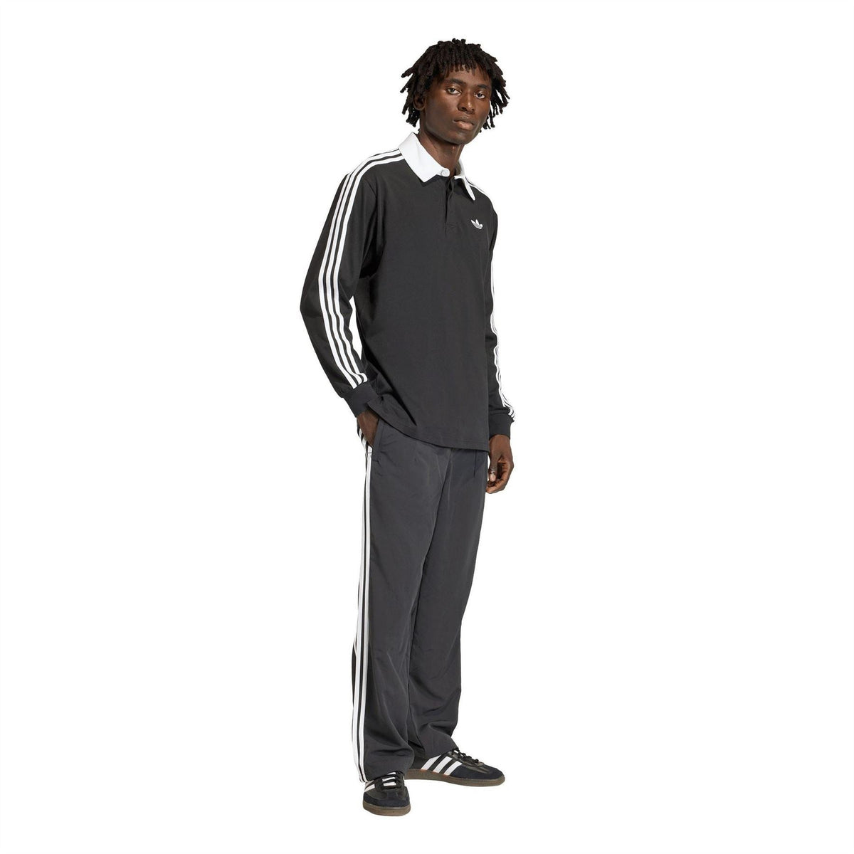 Black long-sleeve collared shirt with white triple stripes on sleeves and adidas logo