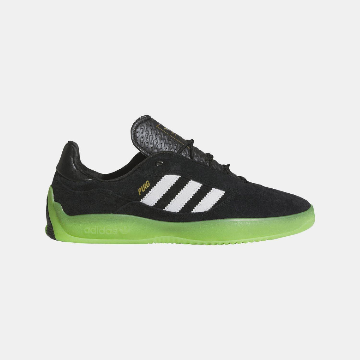 Black low-top adidas Originals trainers with white stripes and neon green sole