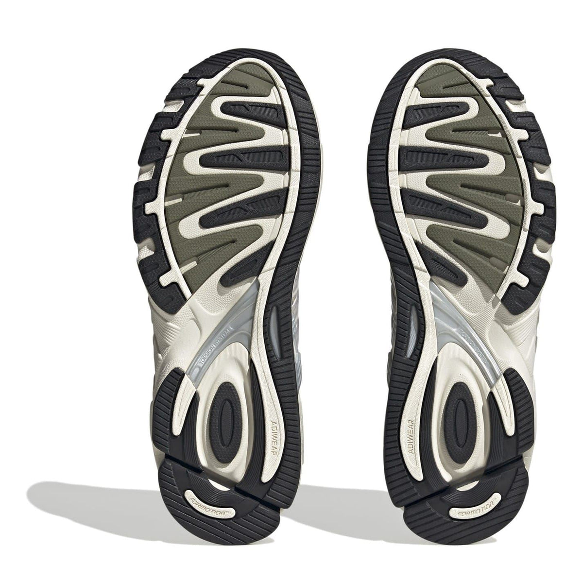 adidas low-top sneaker outsoles, dark traction tread with white sidewalls