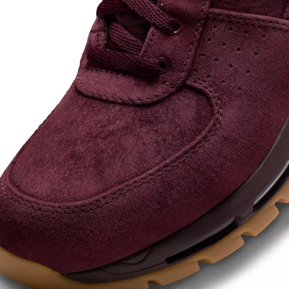 Burgundy suede lace sneaker with stitched seams and Air Max-style window unit