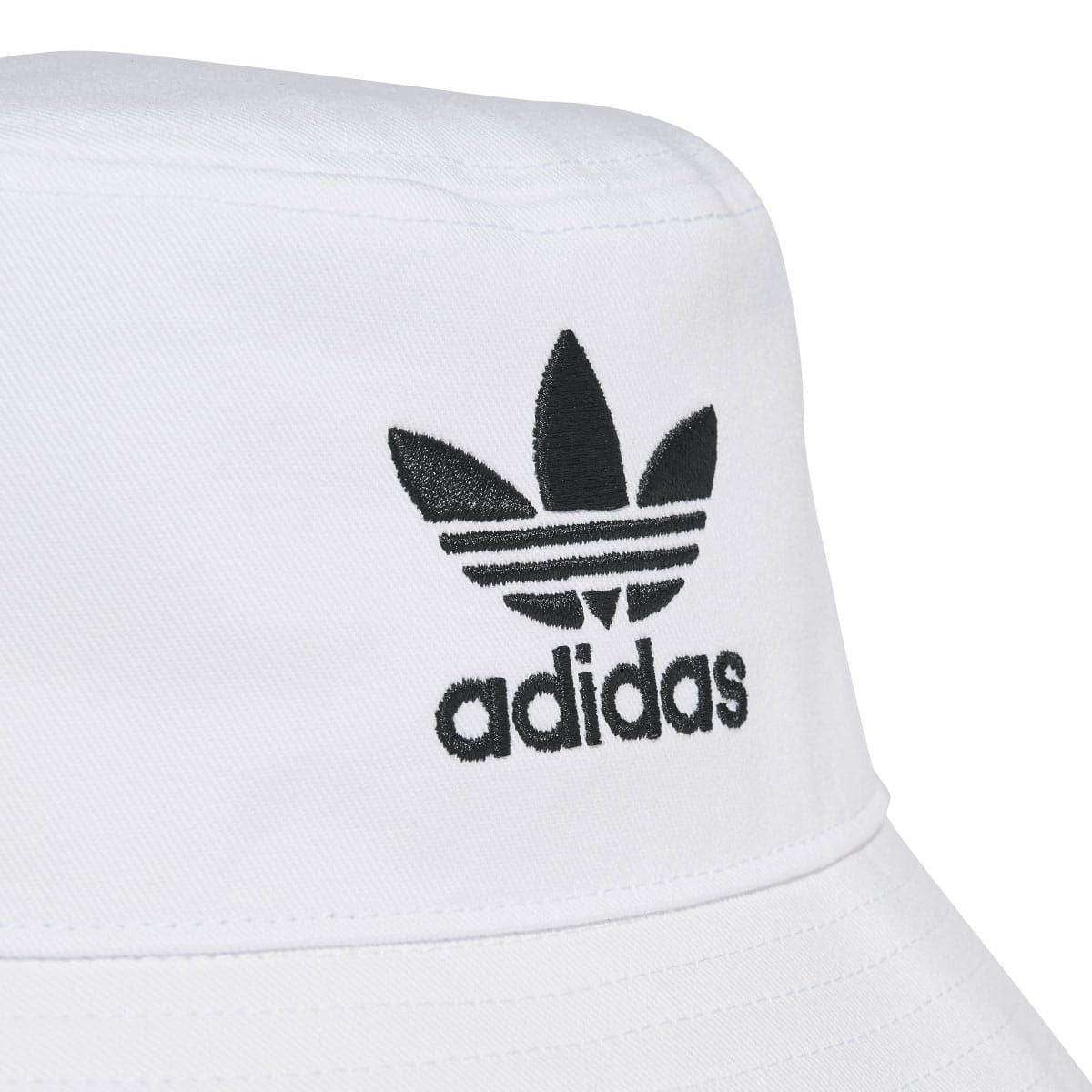 White adidas trefoil bucket hat with large black logo embroidery