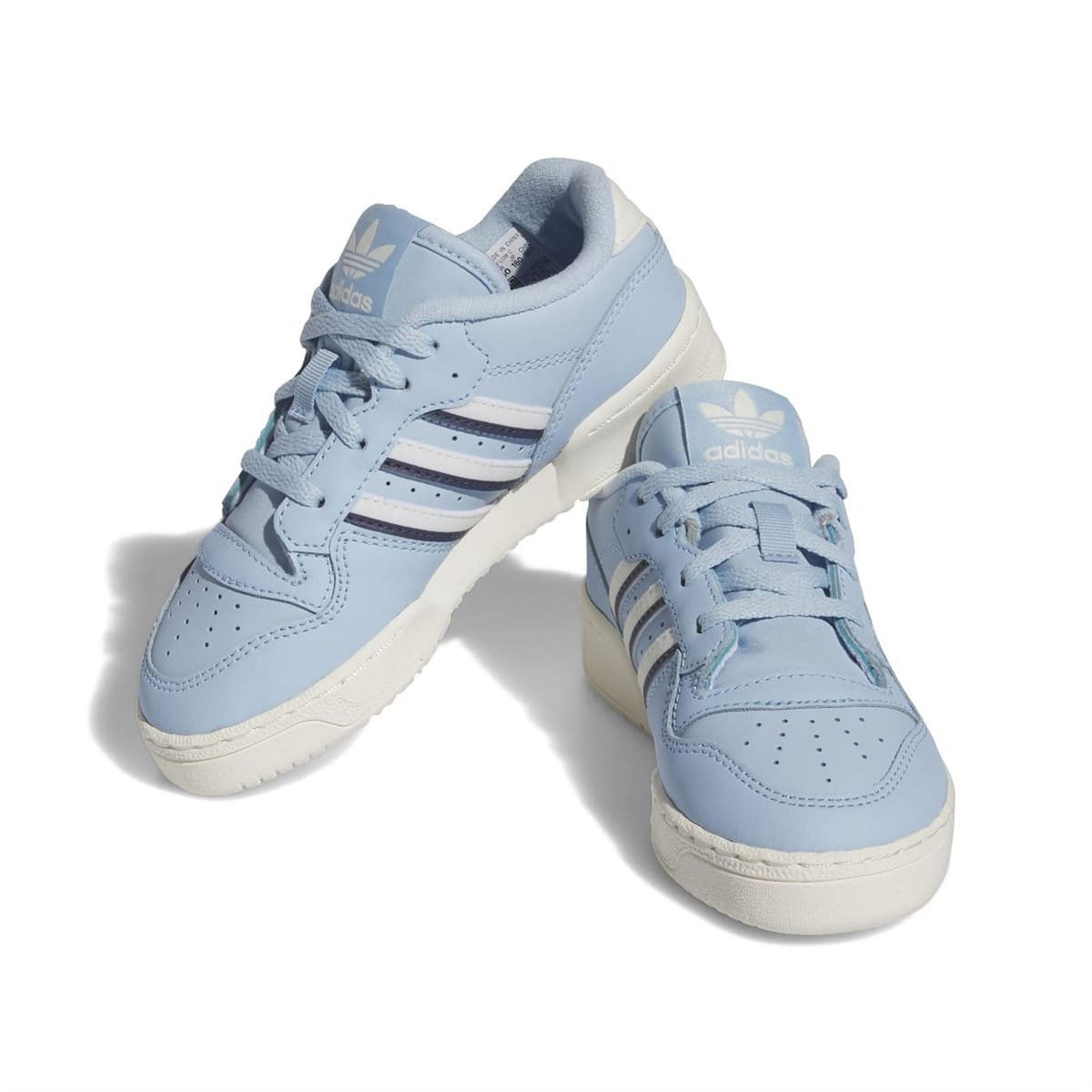 Light blue adidas low-top trainers, angled side view with lace-up and three stripes