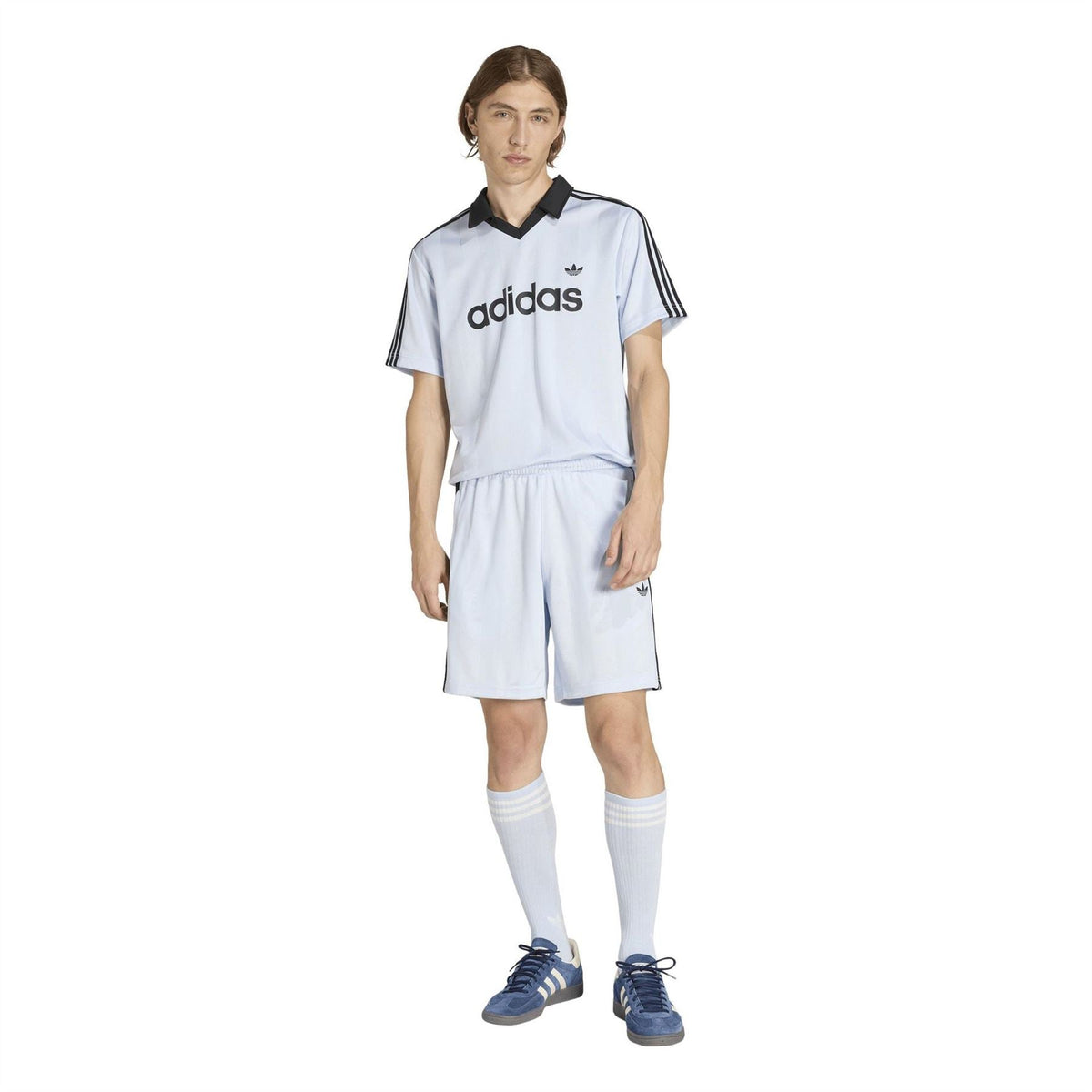 Light blue adidas polo shirt with black collar and logo, worn with matching shorts