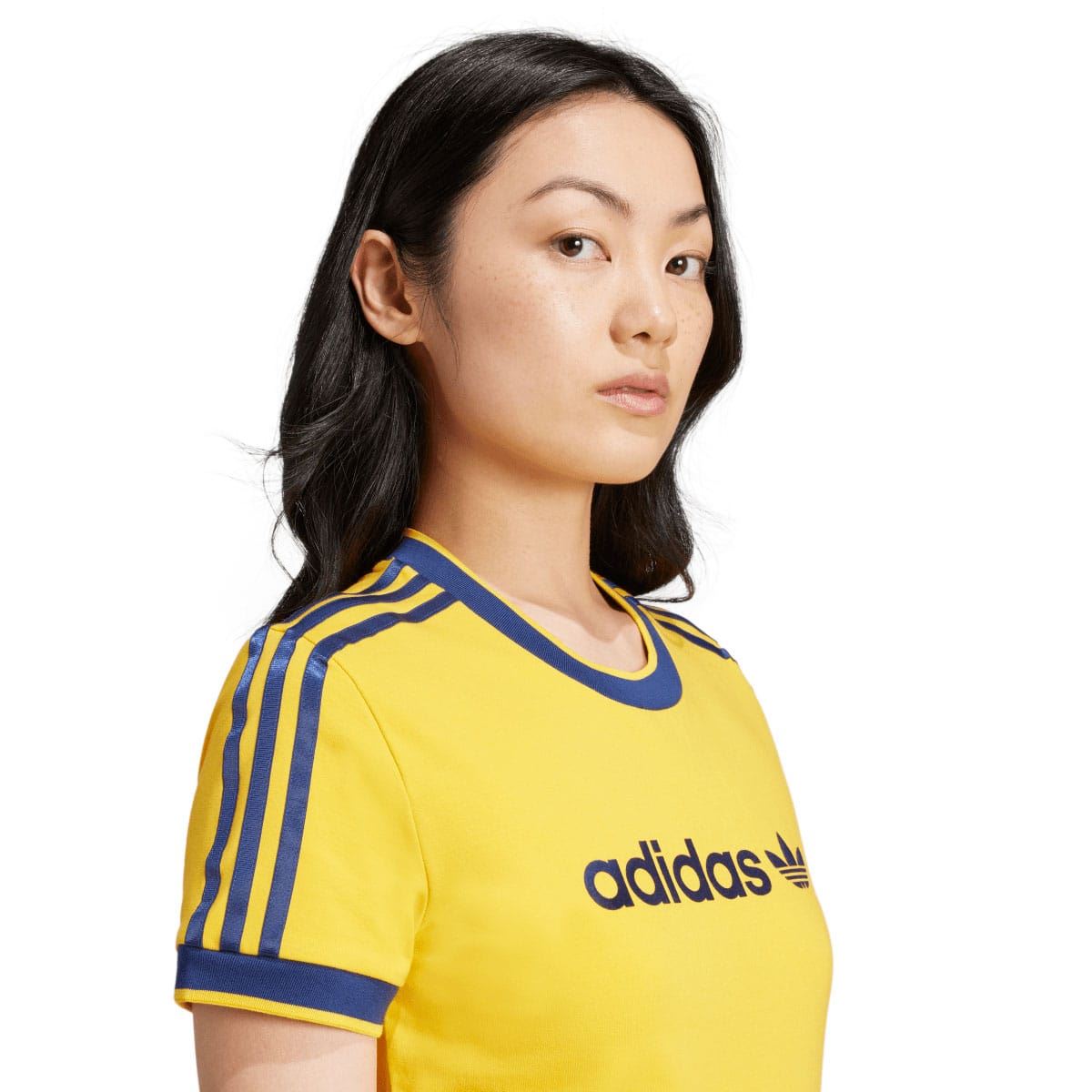 Yellow slim T-shirt with blue crew neck trim and adidas logo on upper chest.