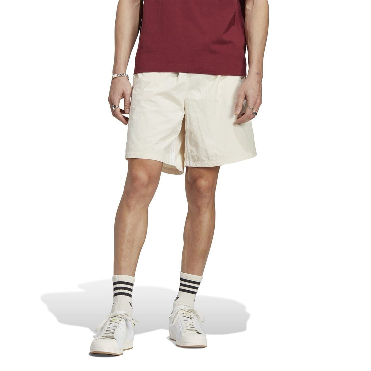 adidas Originals chino shorts in off-white, mid-thigh with front pockets and belt loops
