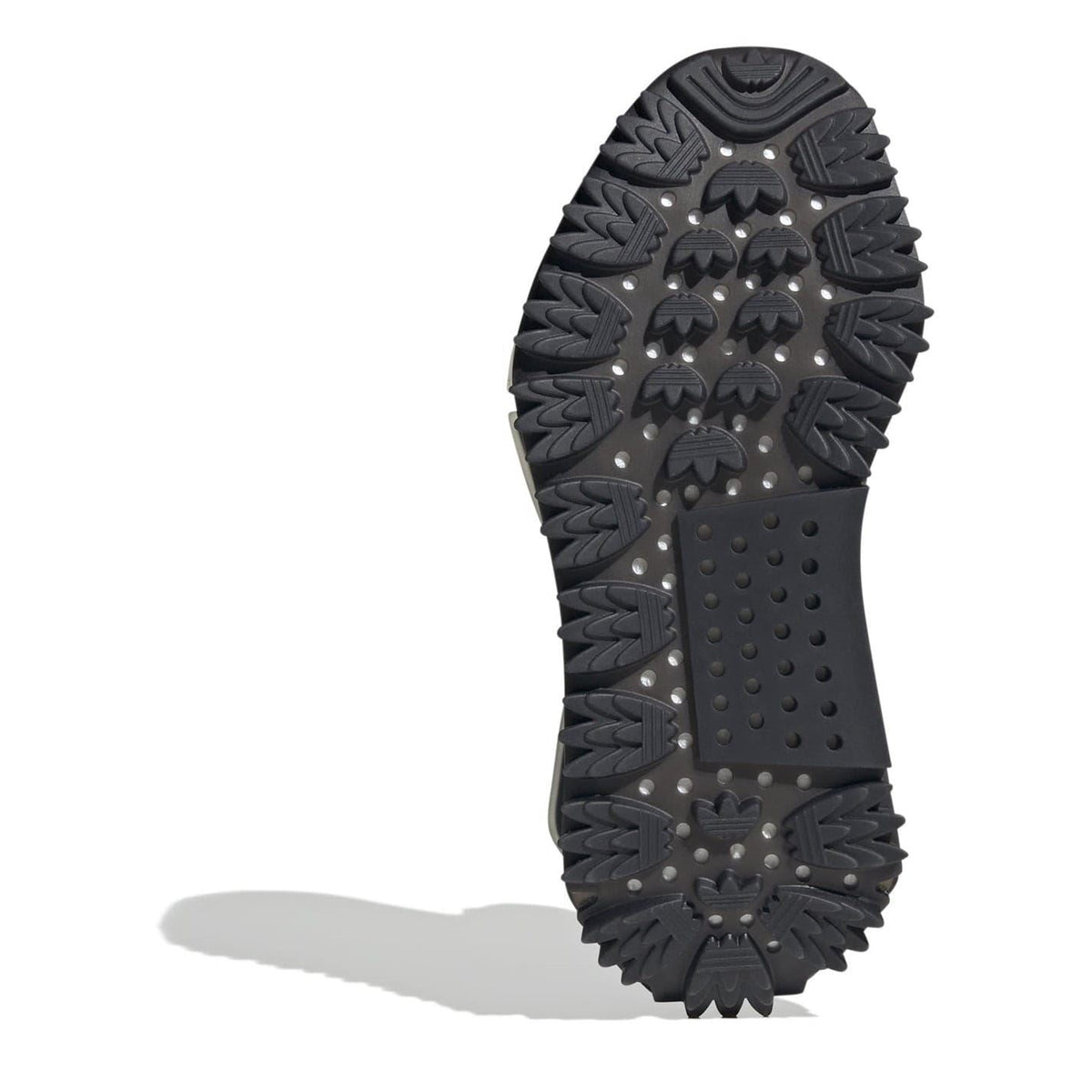 Sole of black knit sock trainers with studded rubber outsole tread