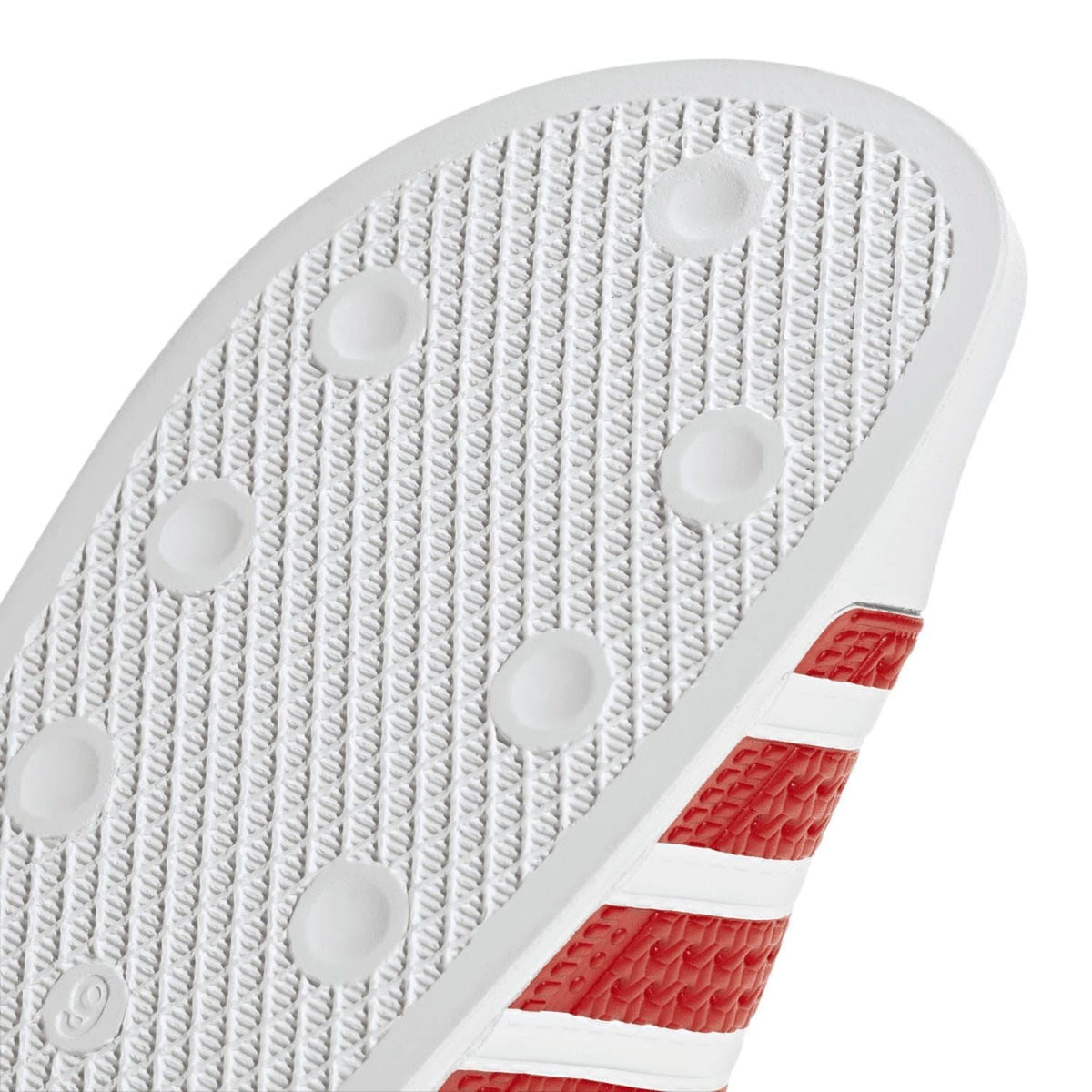 adidas Adilette slide sandal footbed with ridged texture and white grip nubs