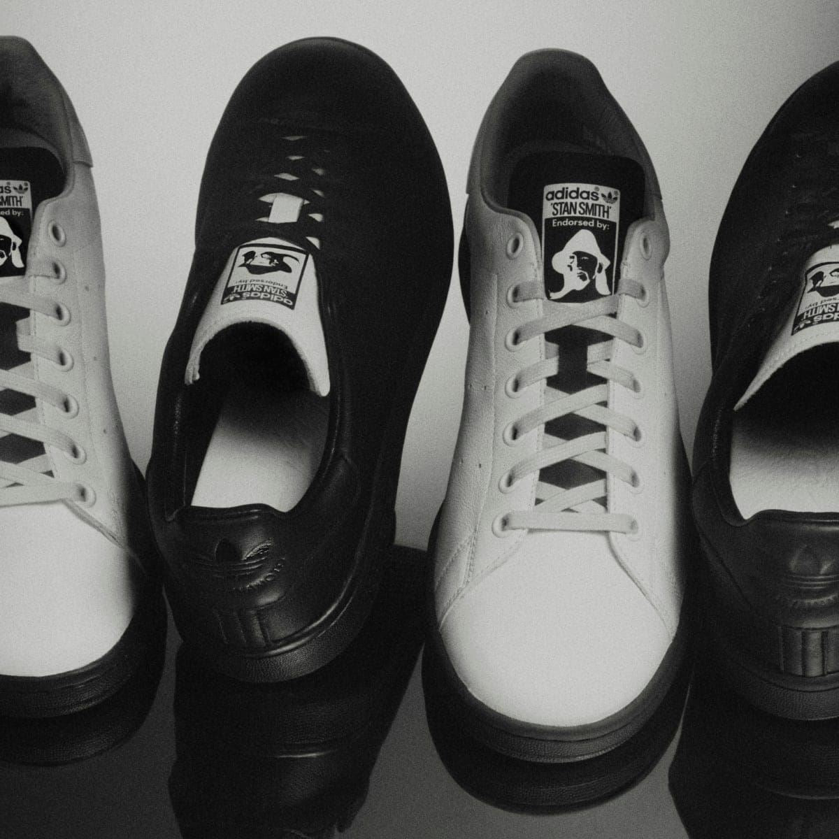 adidas Originals Yohji Stan trainers side view set: black and white pairs with laces