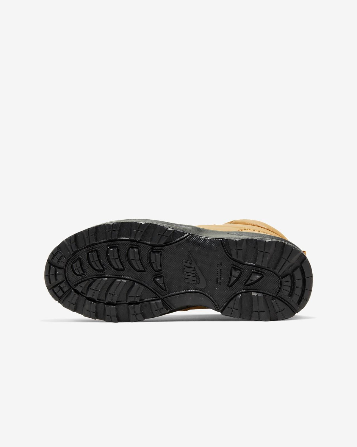 Kids' black treaded boot outsole with wheat midsole edge