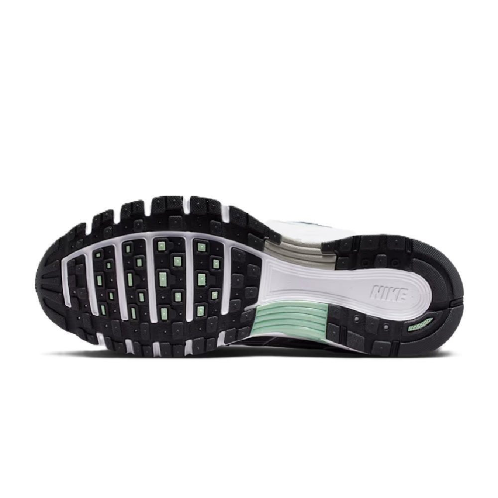 Nike P-6000 women's running shoe outsole, black tread with white midfoot and green panel