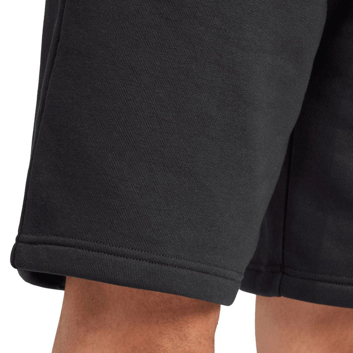 Black adidas Originals shorts with ribbed hem and smooth knit fabric