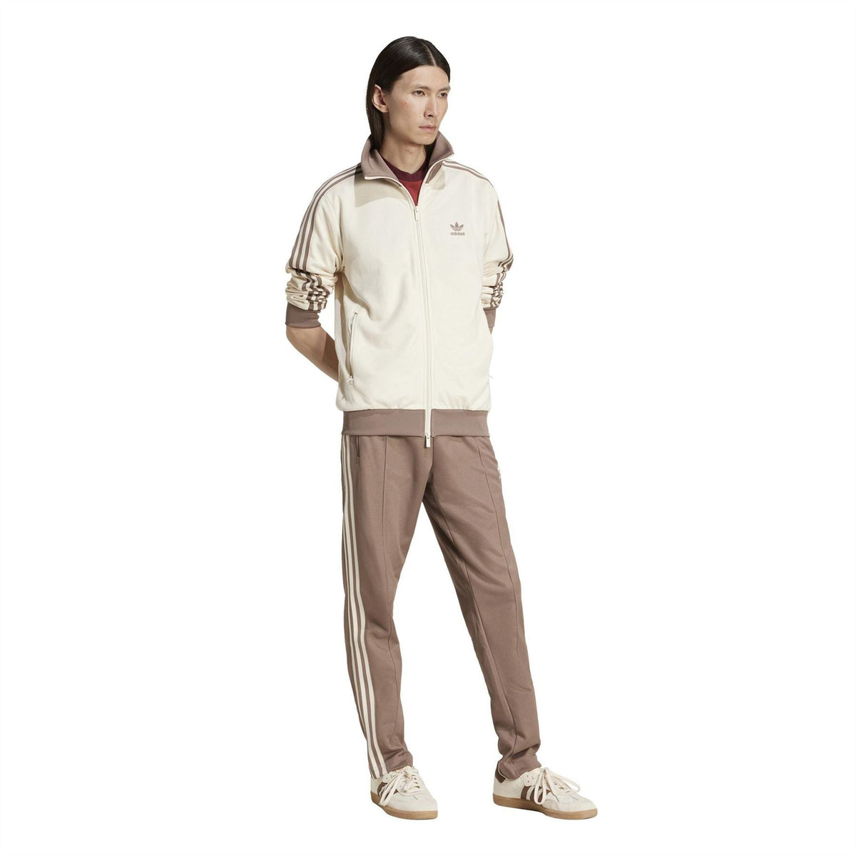 adidas Originals track pants, trace brown with white side stripes and adidas trefoil logo