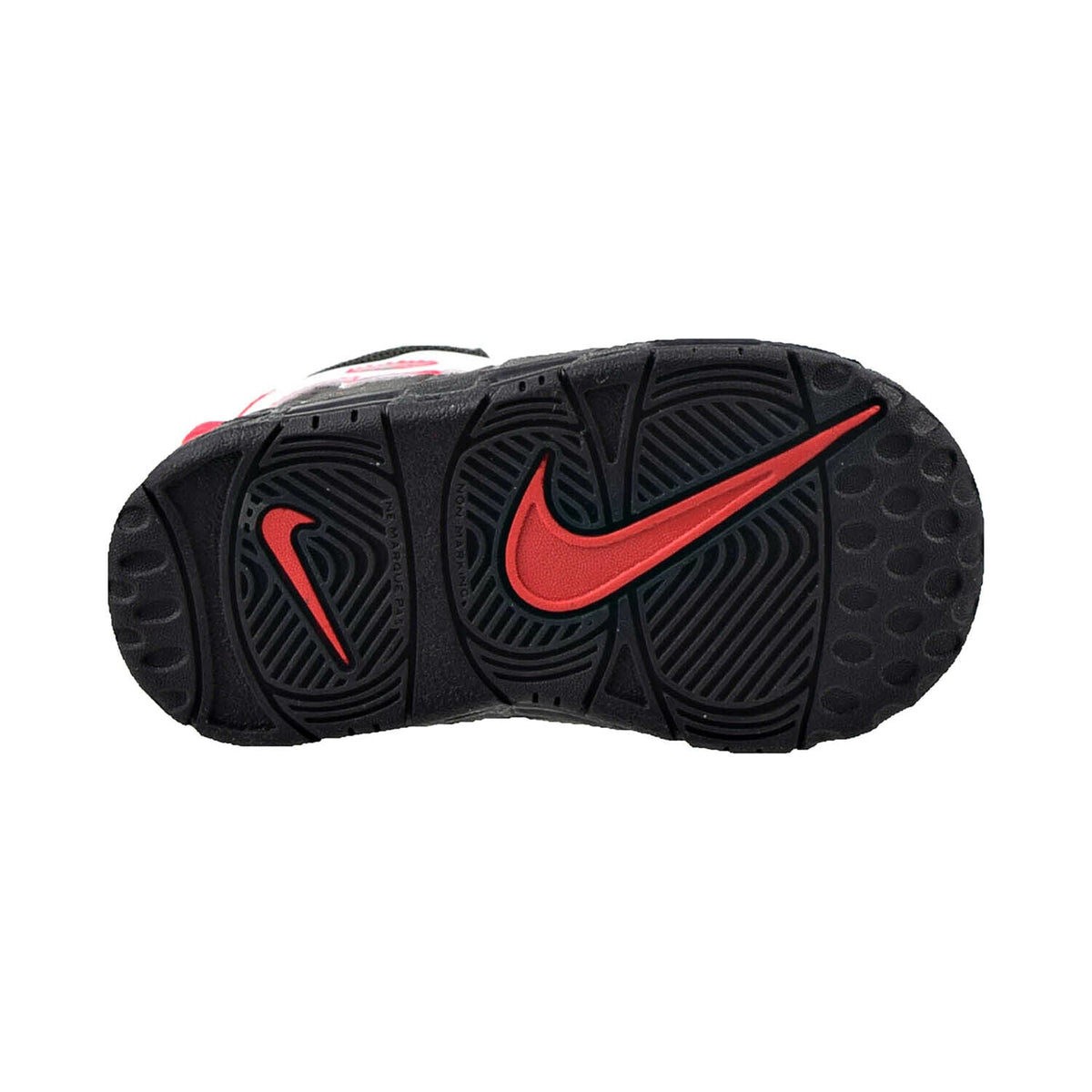 Toddler shoe outsole with black tread and red Nike swoosh mark