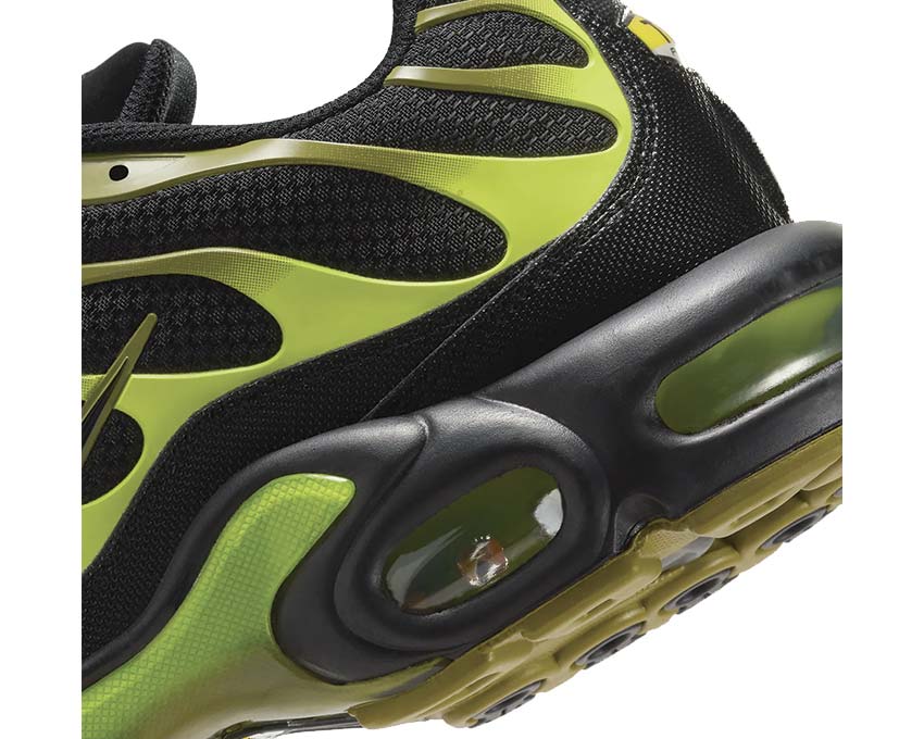 Air Max Plus close-up: black and neon green upper with visible Air unit window