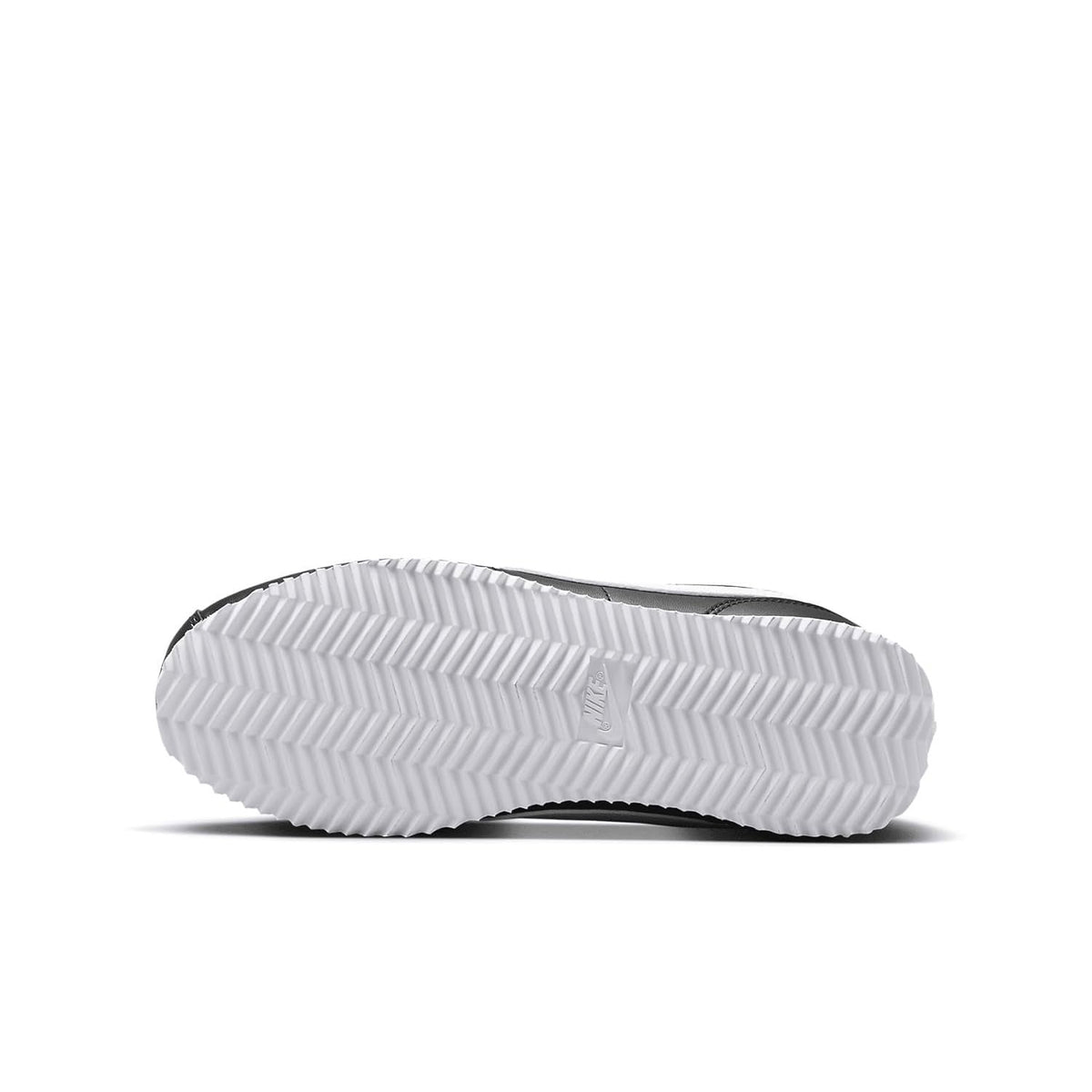 Kids' Nike Cortez outsole tread in white with black upper edge