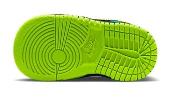 Neon green rubber outsole with deep tread for toddler low-top sneakers