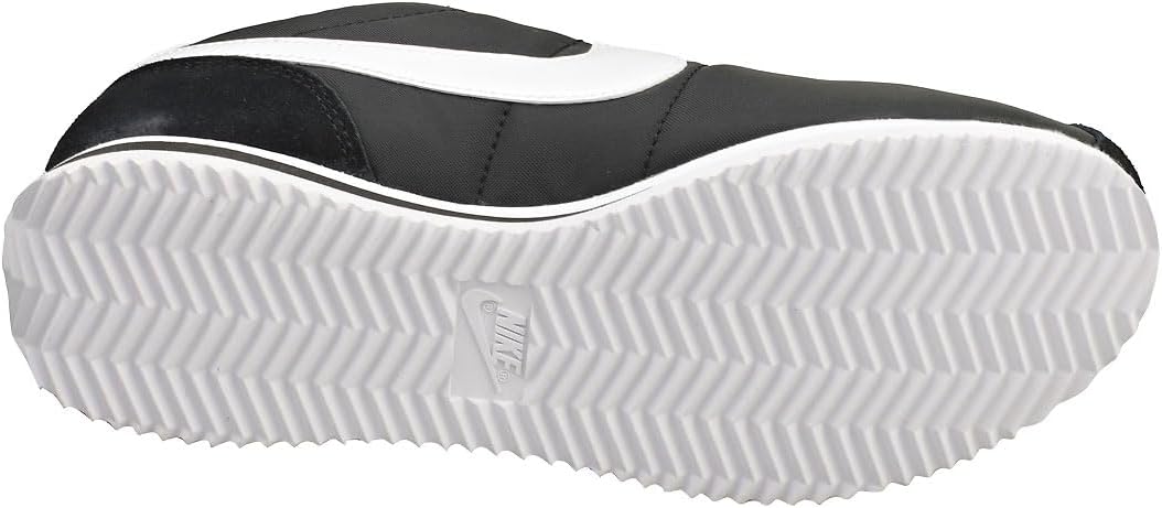 Women's Nike Cortez outsole view, white rubber sole with textured traction pattern