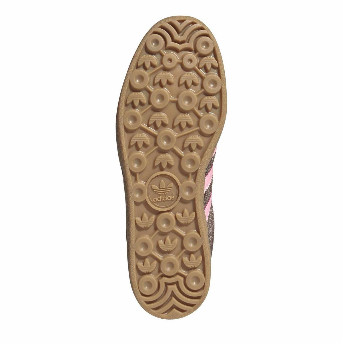 Indoor trainer outsole with adidas tread pattern and gum rubber base