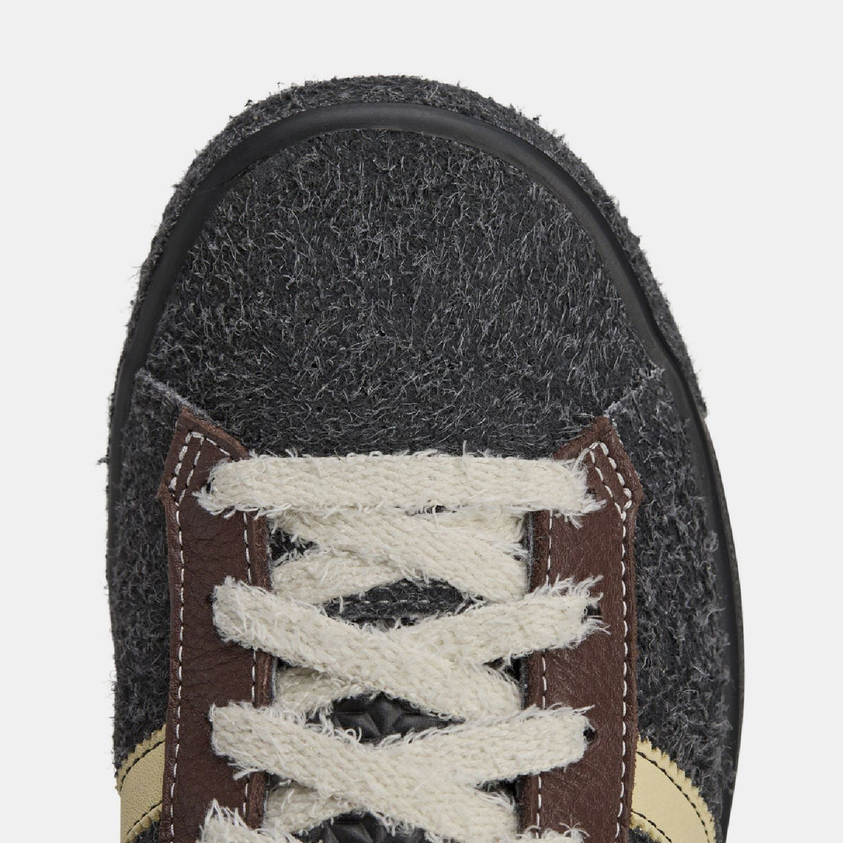 adidas Originals Forest Hills Brain Dead sneakers showing black and white canvas footwear with retro design and lace-up style