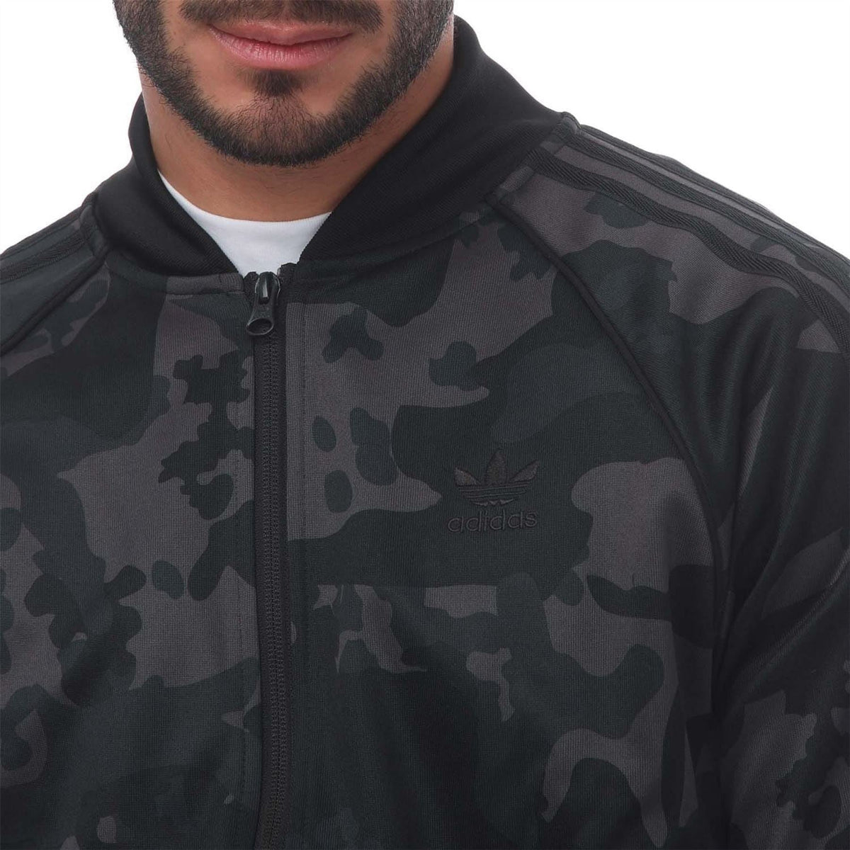 Men's adidas track top close-up, black camouflage full-zip with chest logo