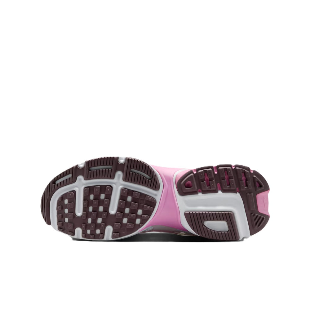 Women's Nike V2K Run sneakers, outsole view with textured tread in pink and dark rubber.