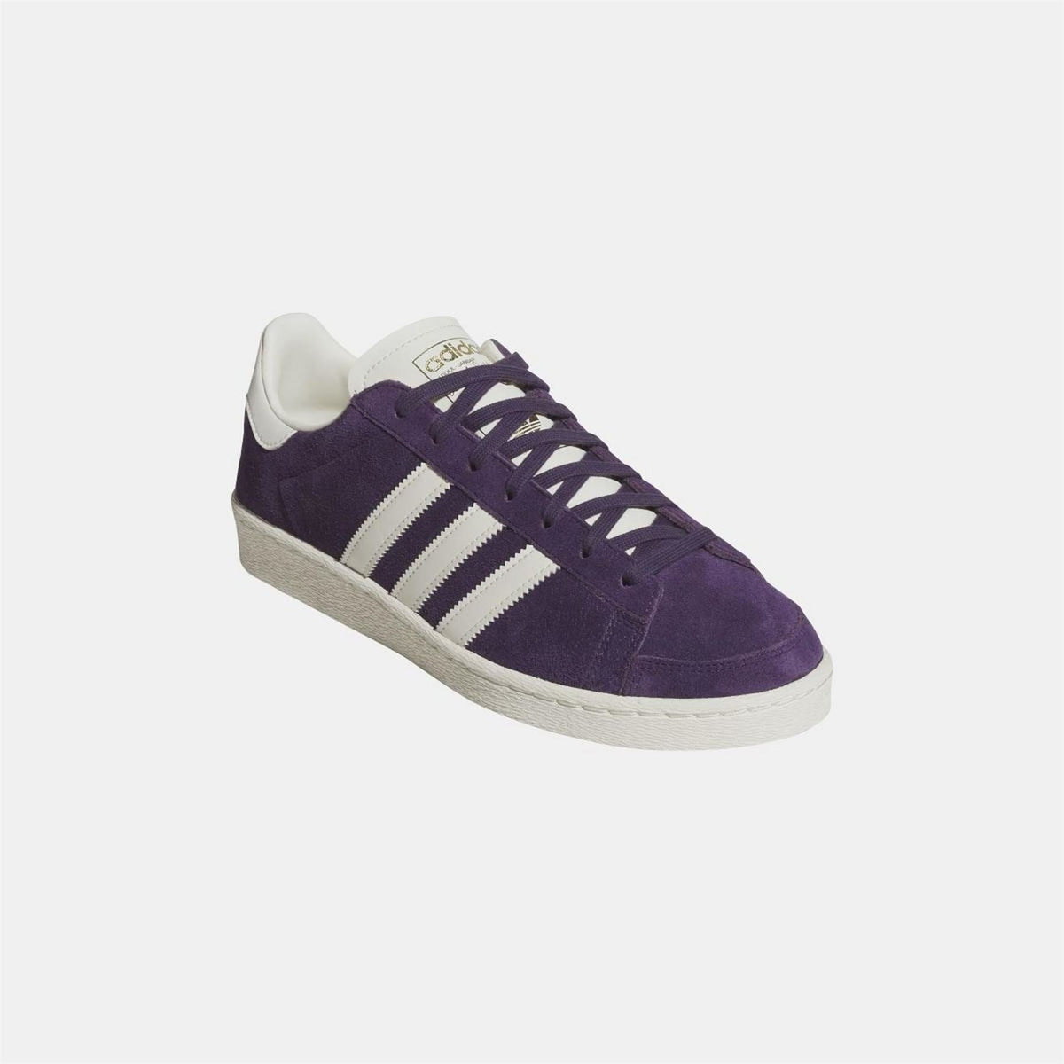 adidas Originals Jabbar Lo shoes in black and white with low-top design and classic styling, featuring white laces and rubber sole