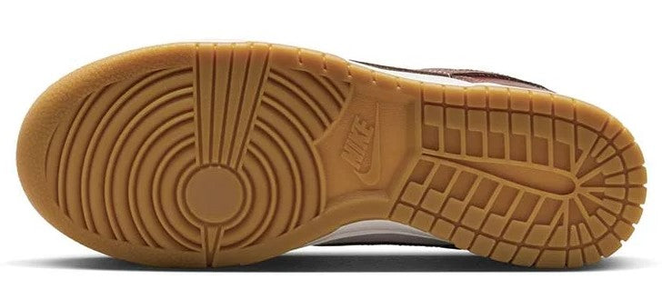 Nike Dunk Low rubber outsole tread with circular pivot and herringbone pattern