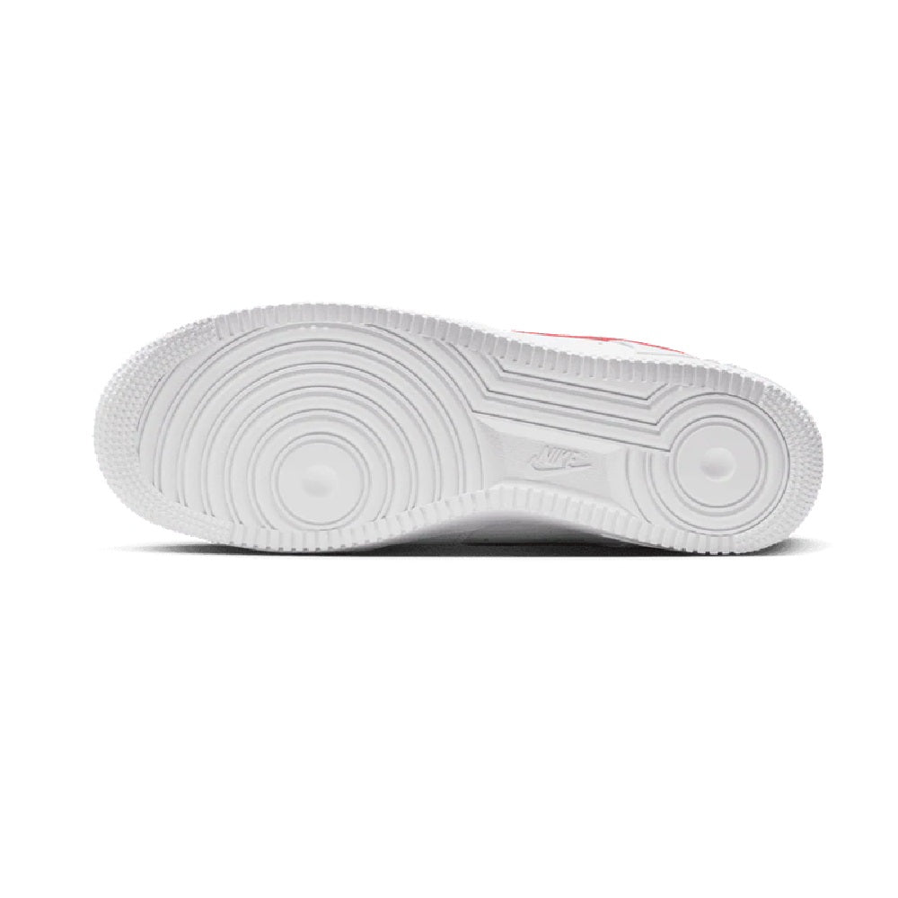 Nike Air Force 1 low-top sneakers, white rubber outsole with circular tread pattern.