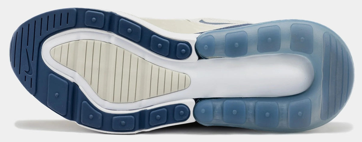 Women’s Air Max 270 outsole view with navy traction pods and blue-tinted heel cushioning