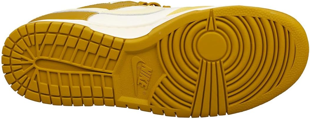 Men's Nike Dunk Low outsole with brown-gold rubber tread and Nike branding