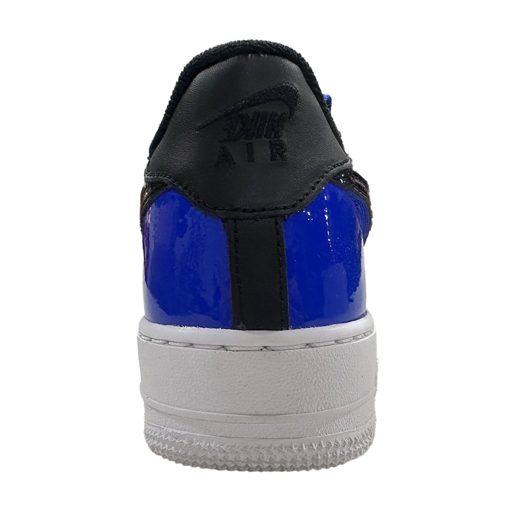 Big kid's Nike Air Force 1 LV8 heel view, black-and-blue upper with white midsole.