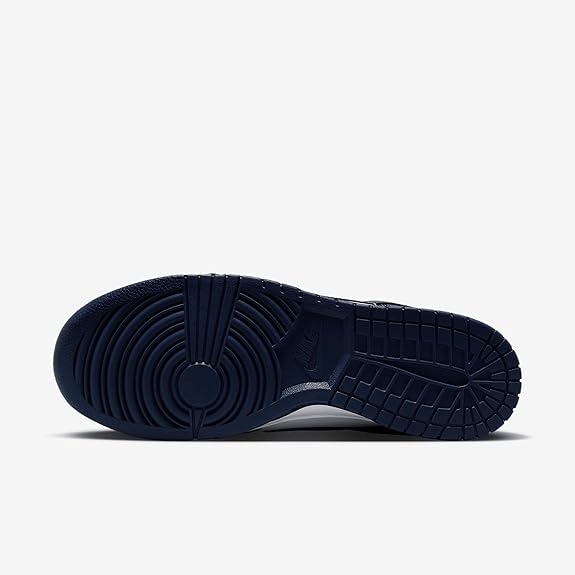 Nike Dunk Low outsole view with navy traction tread and circular rubber detail