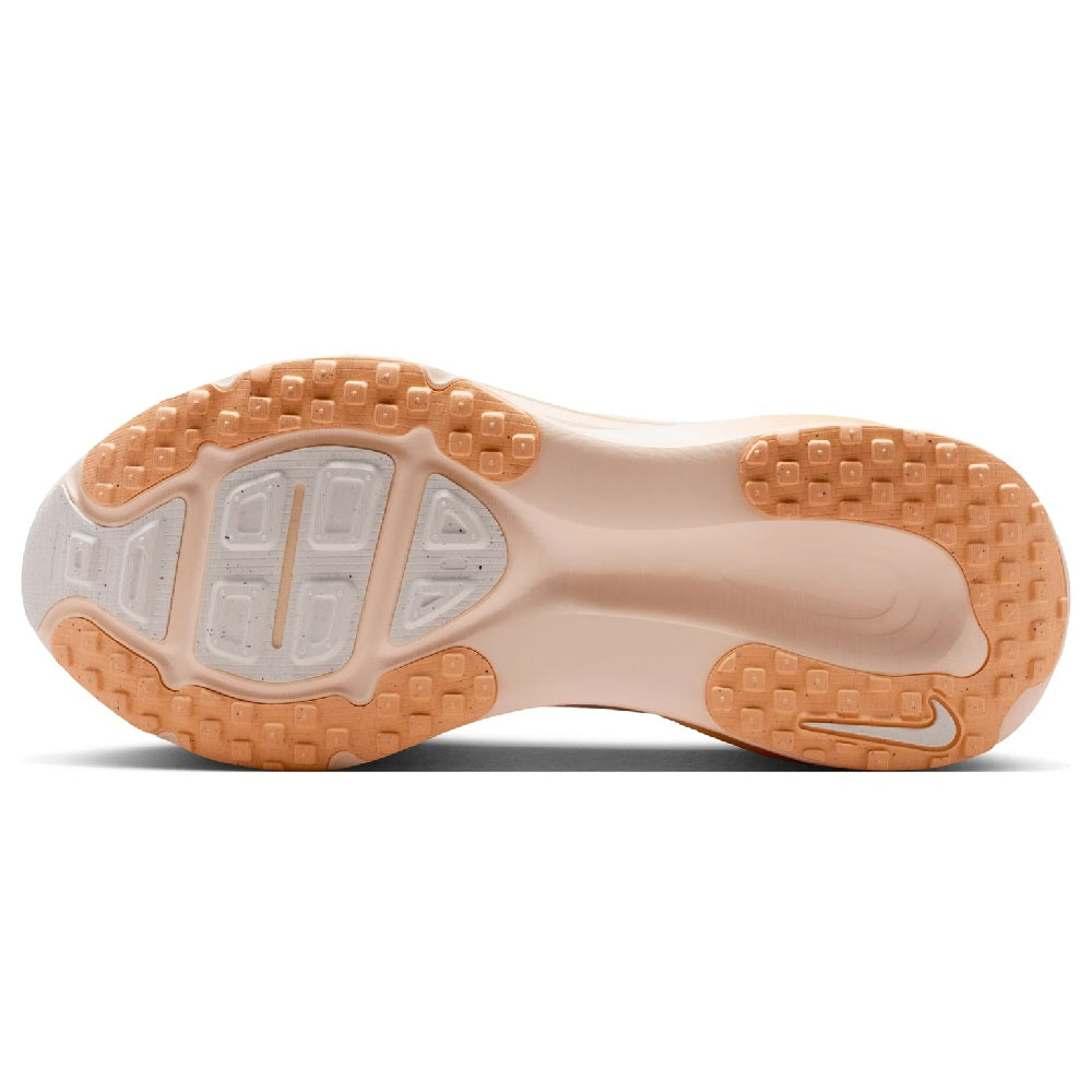 Nike Vomero 18 women's running shoe outsole, tan tread with shock-absorbing design