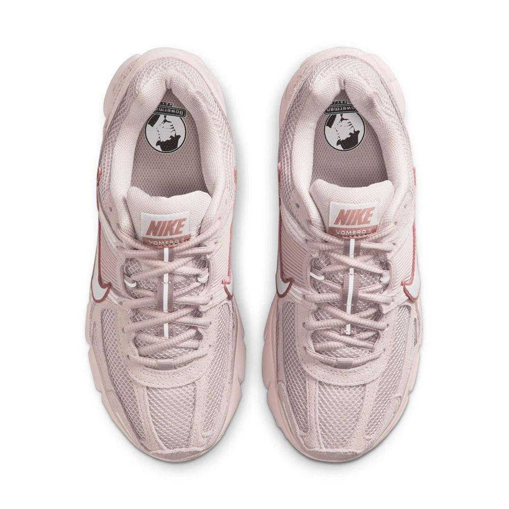 Women's Nike Zoom Vomero 5 shoes, light pink tongue and lace area with Nike logos