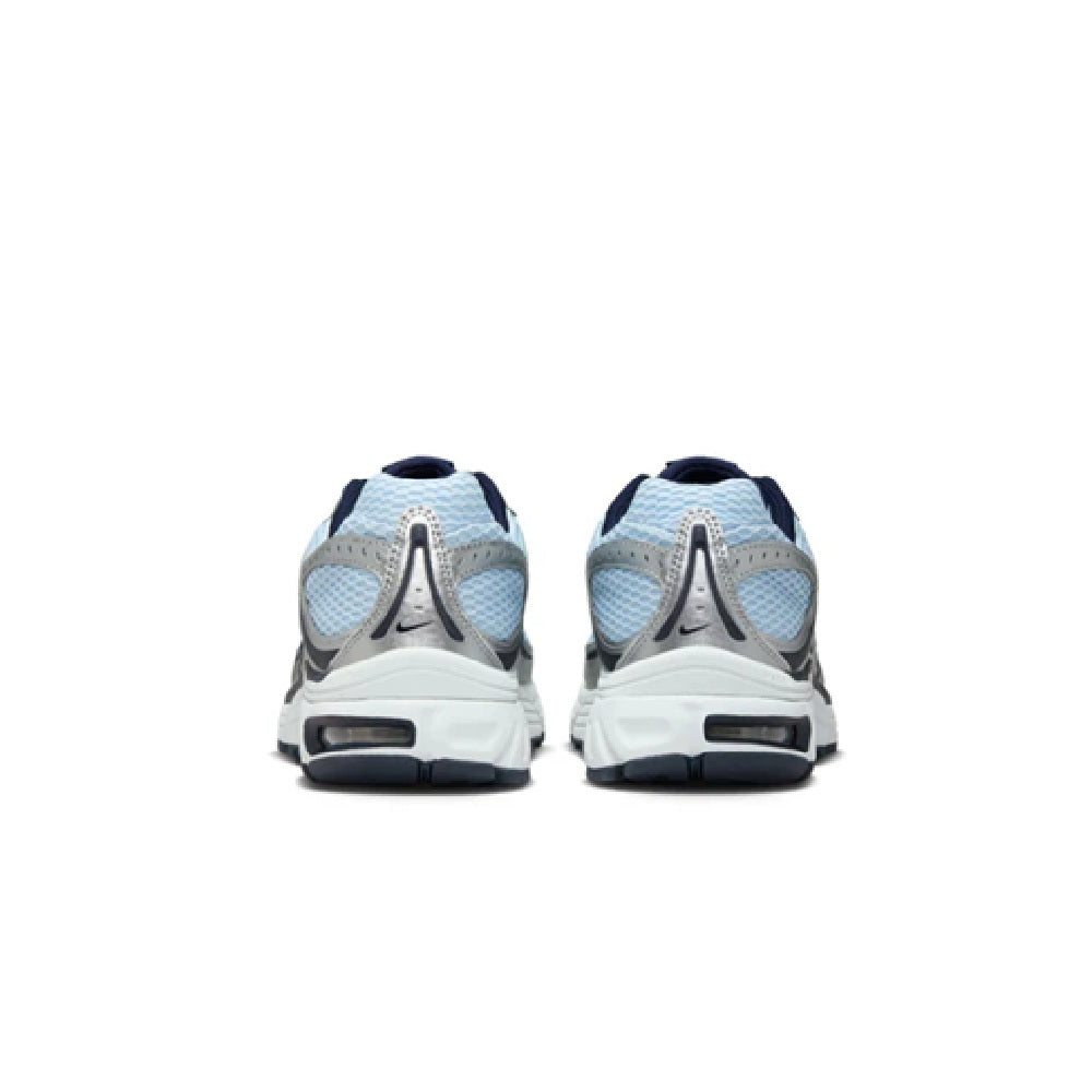 Women's Nike Air Max Moto 2K sneakers, rear view with navy heel tab and grey cushioning